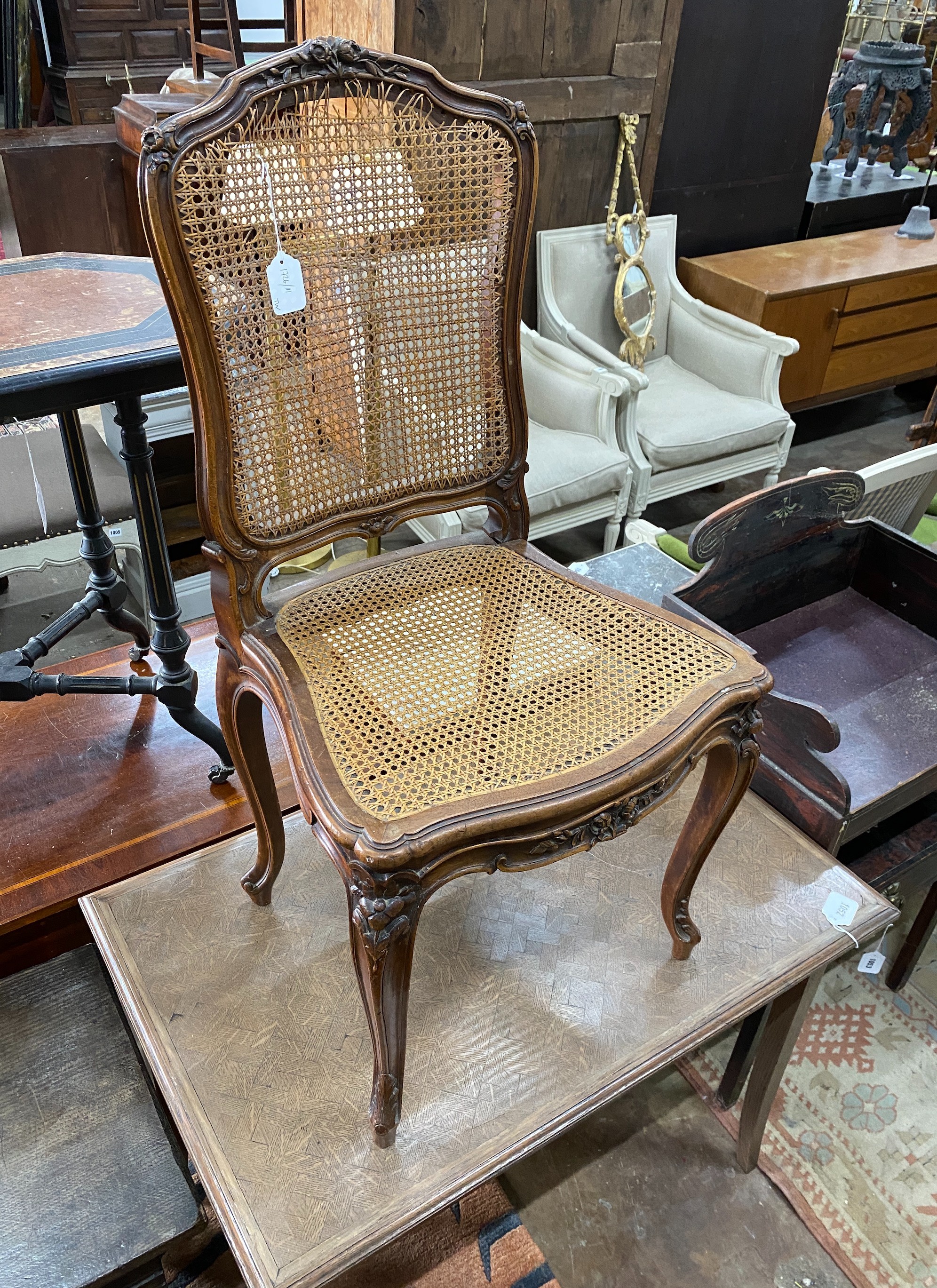 An early 20th century rectangular oak parquetry side table, width 92cm, depth 57cm, height 71cm together with a French caned side chair